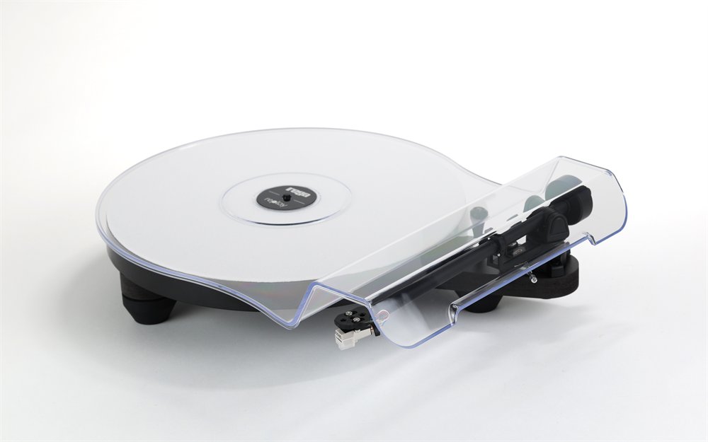 The Rega Replay in matt black, three-quarter view, clear dust cover closed over the white platter mat and the RB110 tonearm.